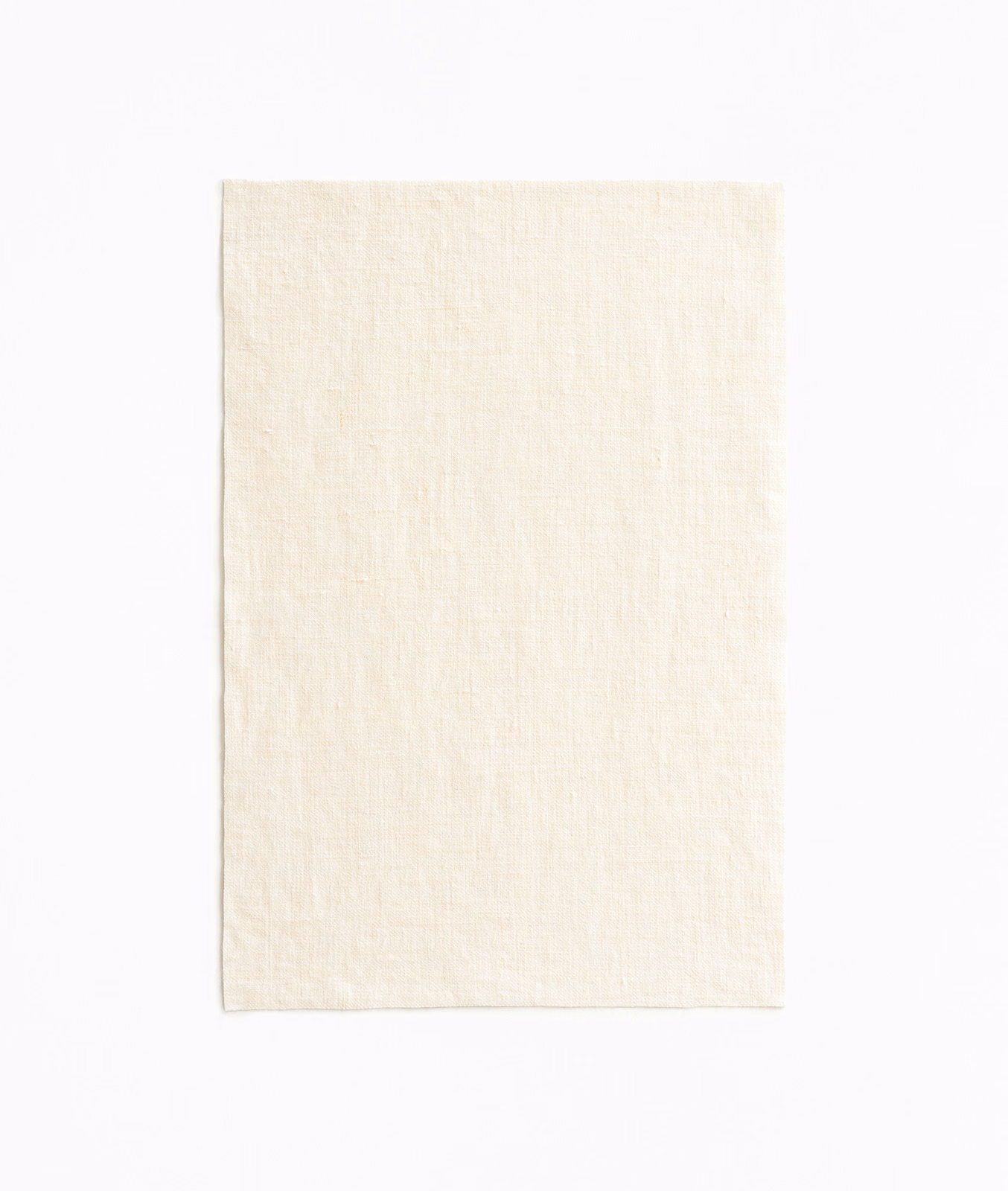 Warm ivory Adelphi Latte swatch with a fine, softly irregular woven texture