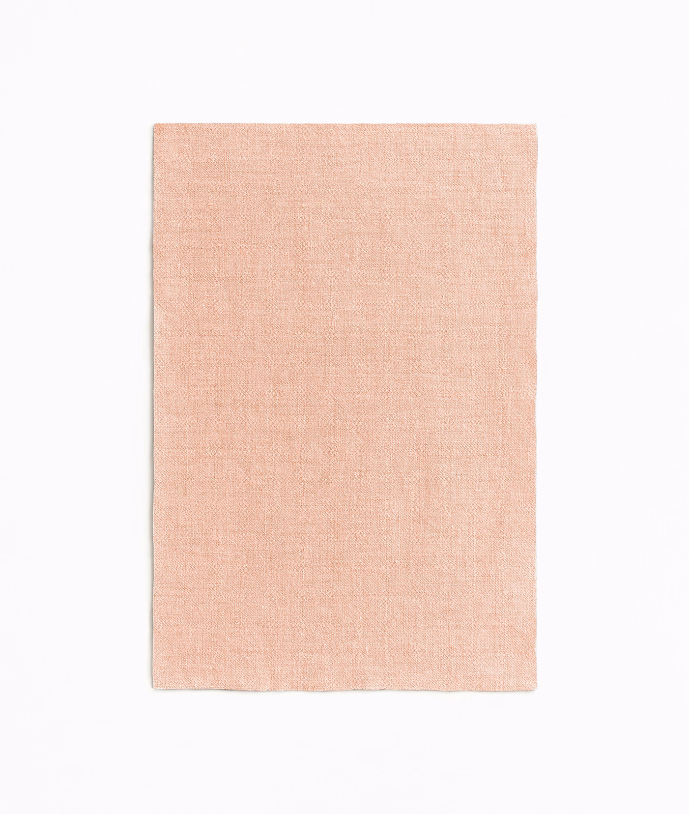 Pale blush nude sheer textile with a subtly irregular fine plain weave