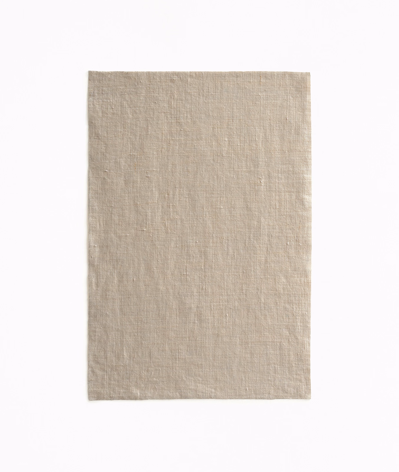 Pale taupe sheer fabric swatch with a fine irregular woven texture