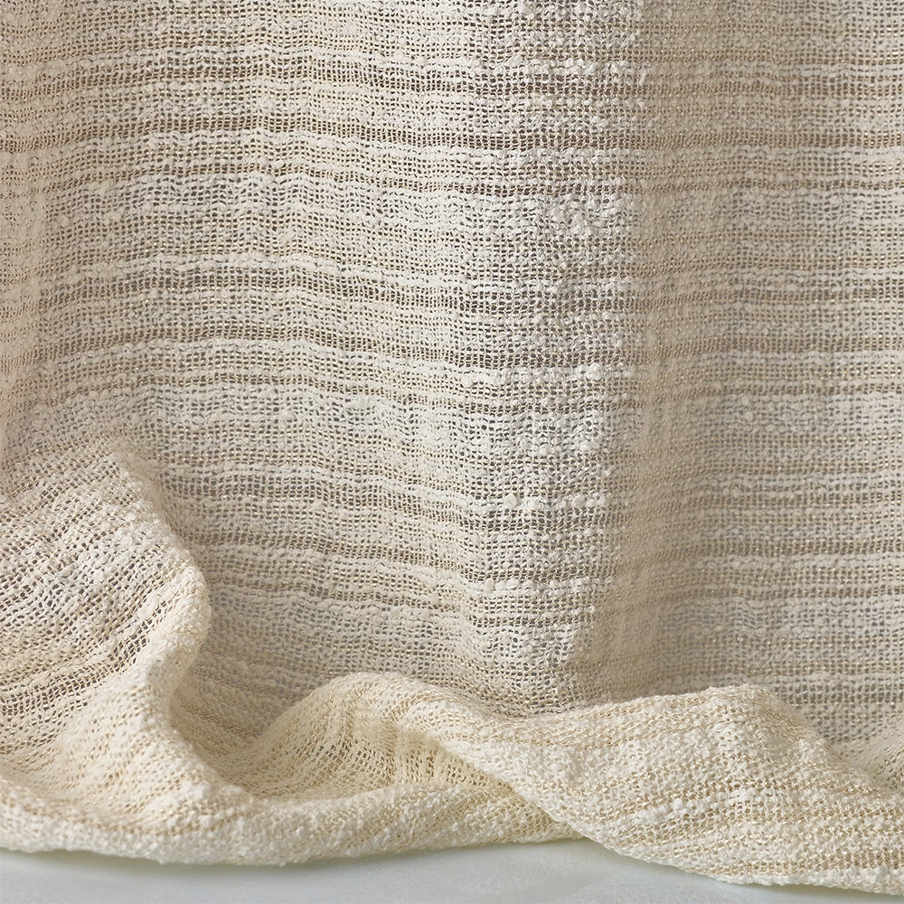 Warm ivory sheer weave with open horizontal slubs and softly translucent folds