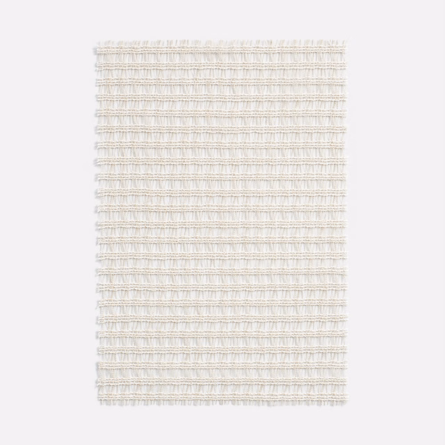 Pale ivory sheer swatch with fine horizontal ridged weave and subtle natural texture