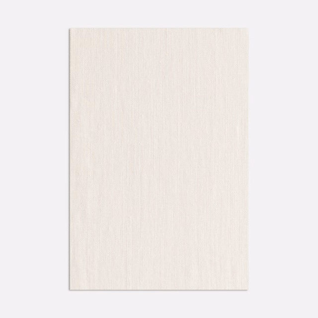 Pale ivory sheer fabric with delicate vertical striations and softly textured weave