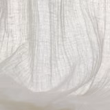 Pale ivory sheer fabric with open vertical weave gathered into translucent folds