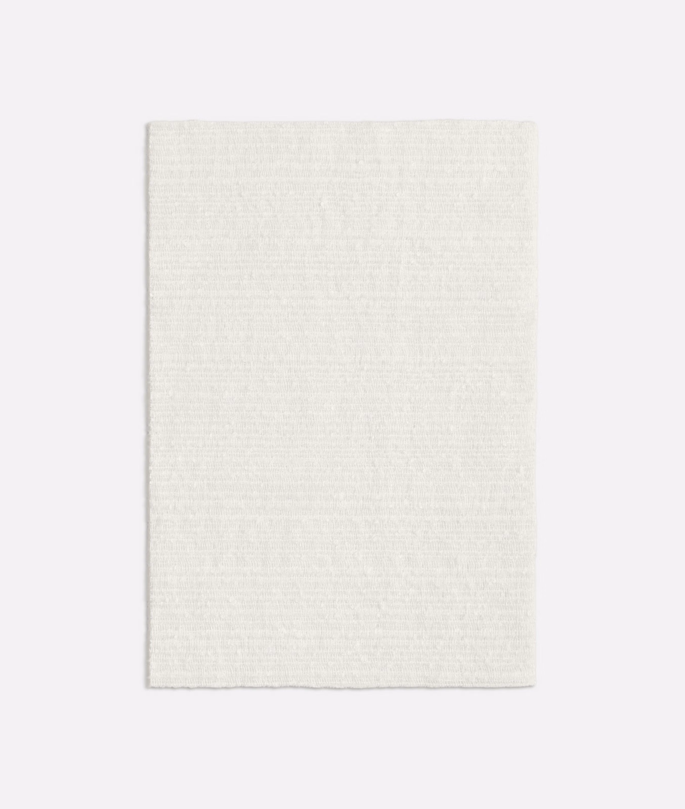 Pale ivory sheer cloth with a fine, softly irregular woven surface