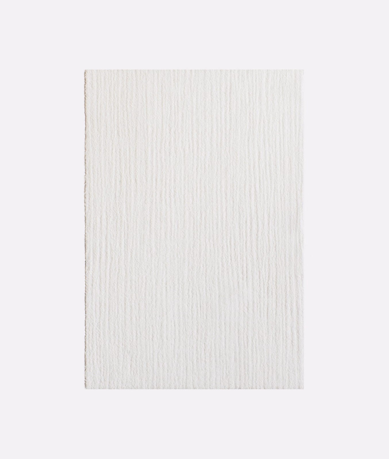 Ivory sheer fabric swatch with fine irregular vertical ribbed texture