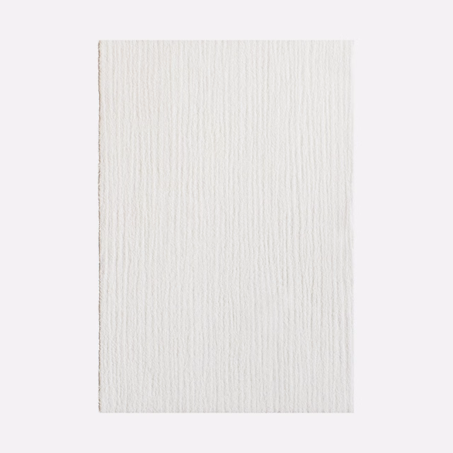 Ivory sheer fabric swatch with fine irregular vertical ribbed texture