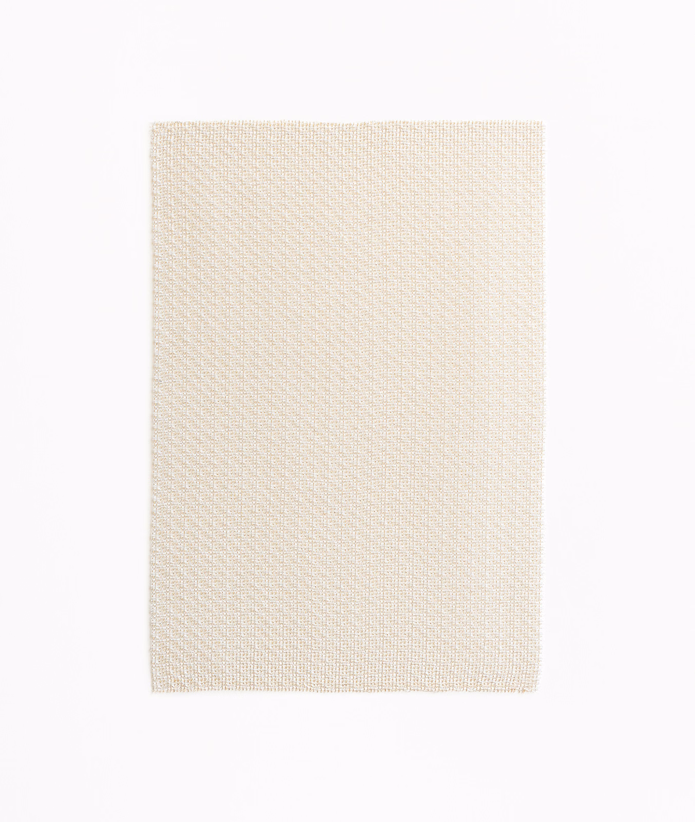 Warm ivory sheer fabric swatch with a fine diagonal woven texture