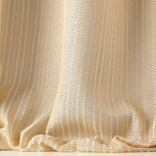 Warm ivory sheer cloth with fine beige vertical stripes in gathered folds