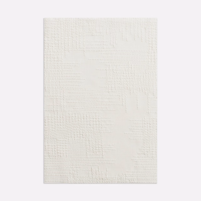Warm ivory sheer with subtle raised grid marks and irregular woven texture