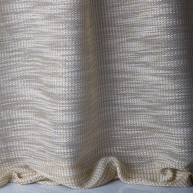Pale greige sheer fabric with irregular horizontal weave in gathered folds