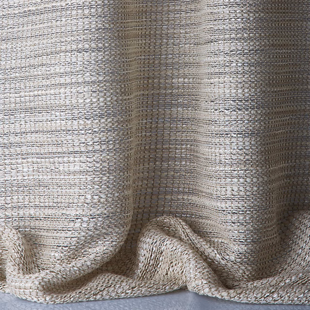 Warm stone-taupe sheer weave with looped texture gathered into soft folds