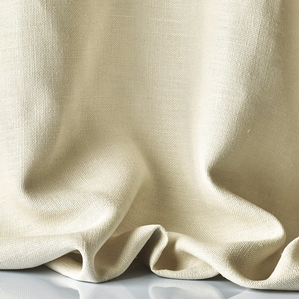 Warm mastic taupe sheer fabric with fine weave falling in softly sculpted folds