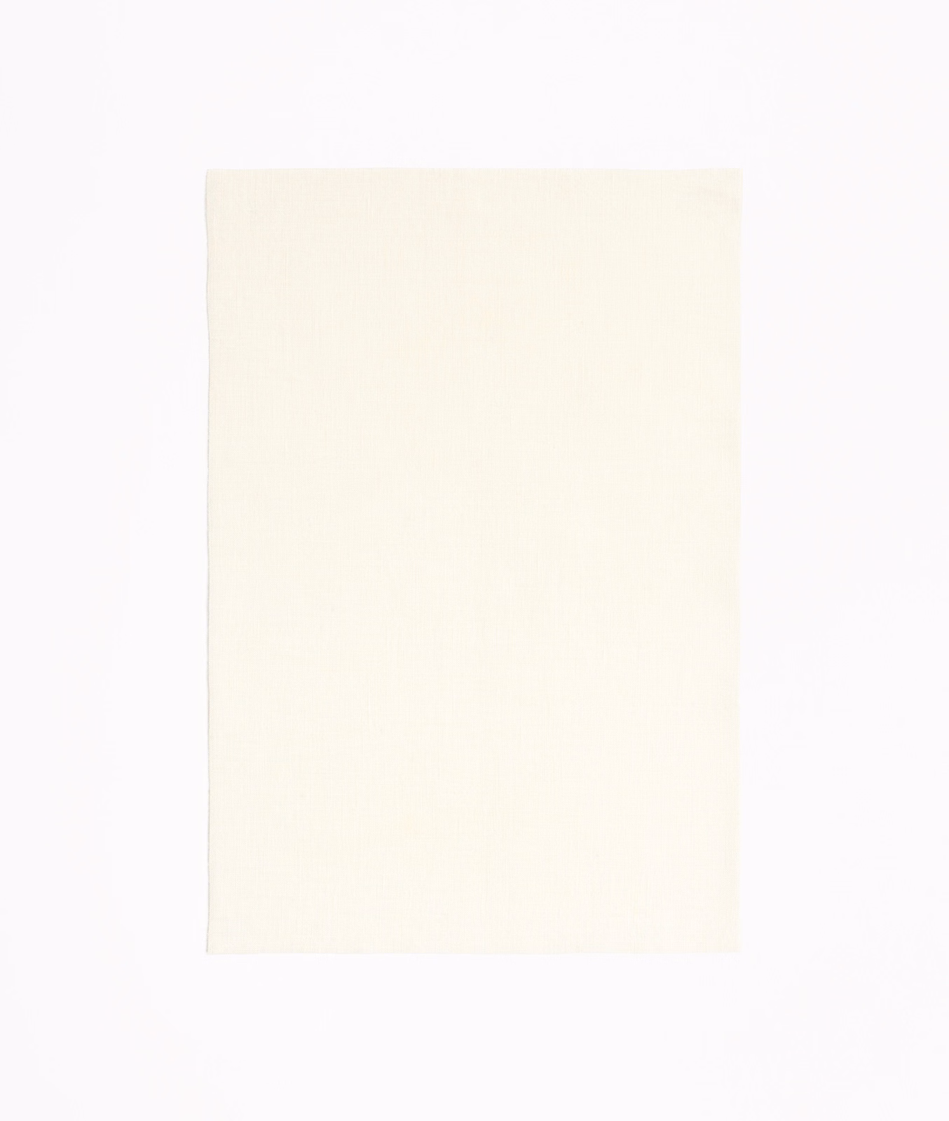 Pale warm ivory sheer fabric with an almost invisible fine plain weave