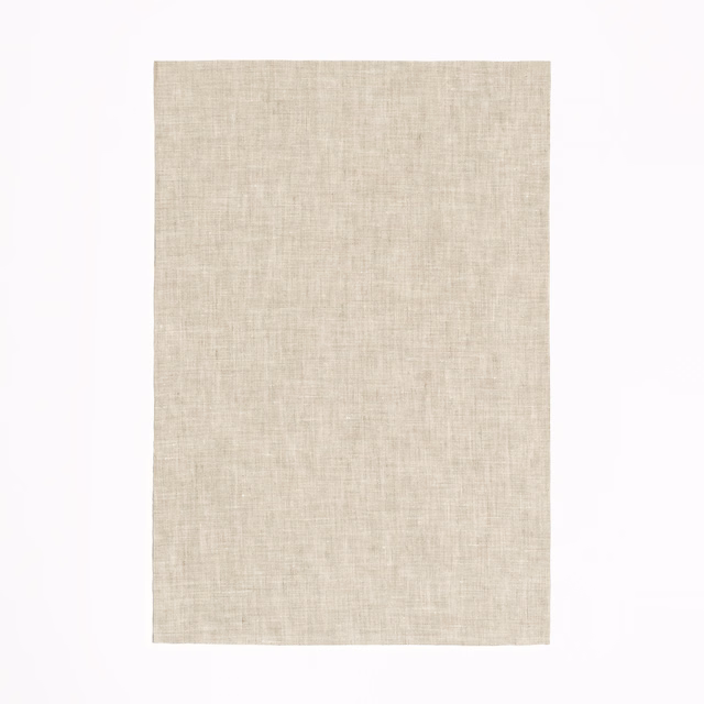 Pale warm beige fabric with a fine, softly crosshatched linen weave