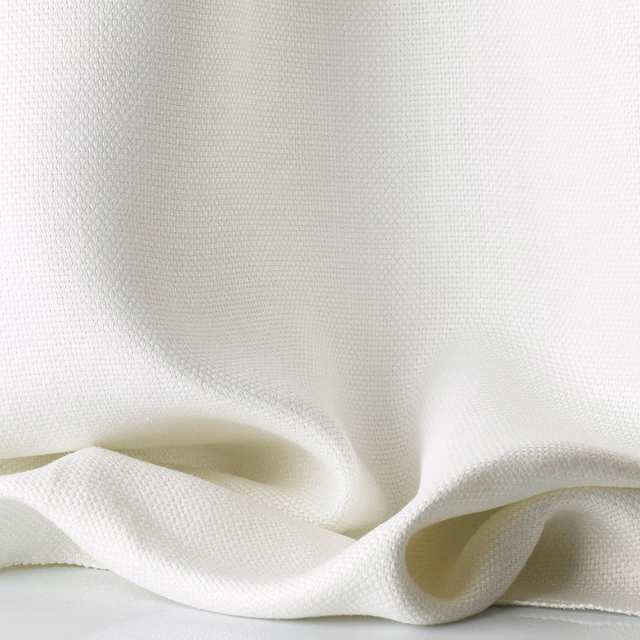 Soft ivory sheer weave gathered into fluid folds with subtle surface texture