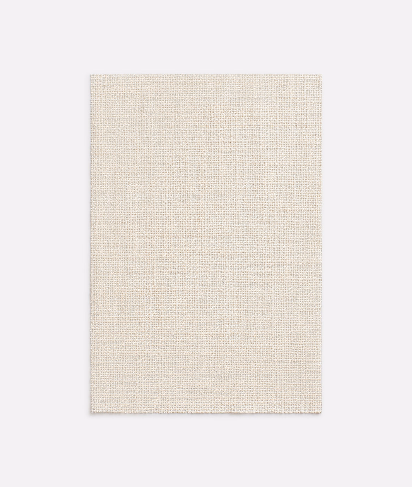 Warm ivory sheer fabric with a fine open plain weave and subtle linen texture