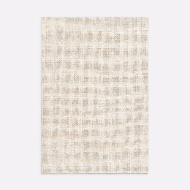 Warm ivory sheer fabric with a fine open plain weave and subtle linen texture