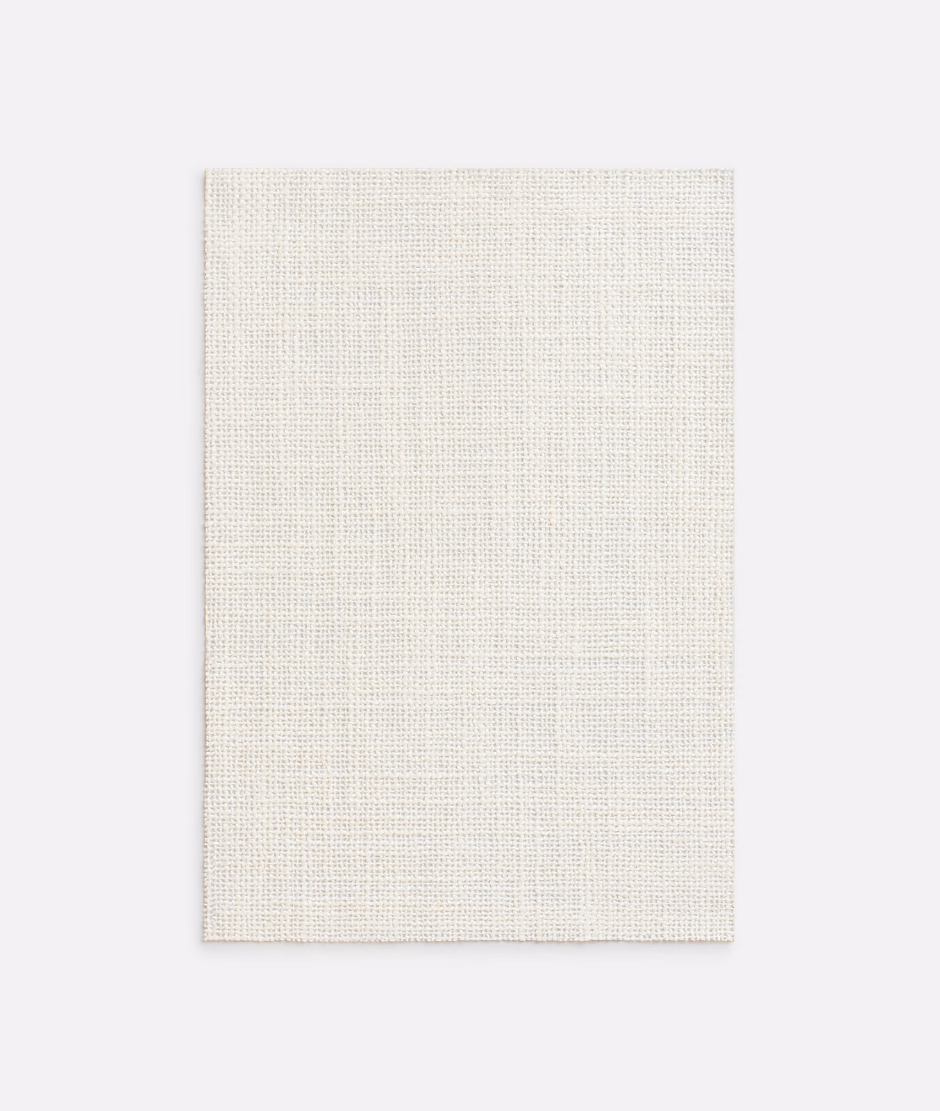 Pale ivory Baobab fabric showing a fine, softly gridded linen-like weave
