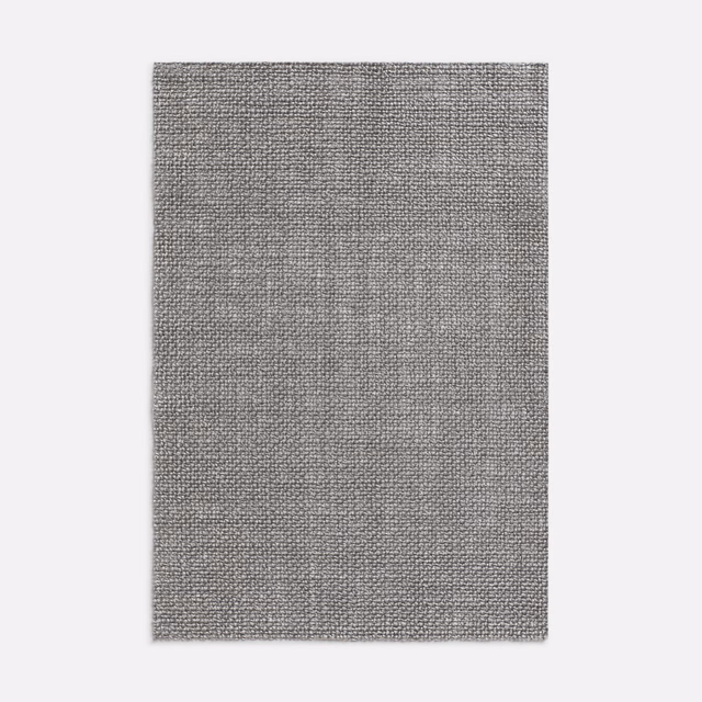 Close plain weave in muted taupe-grey, showing a subtle linen-like texture