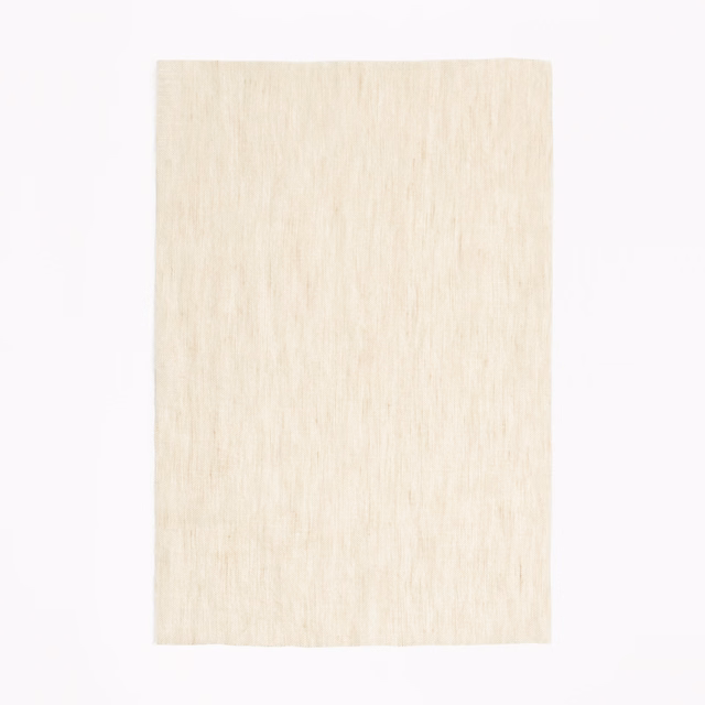 Pale ivory sheer fabric with softly irregular vertical linen-like striations