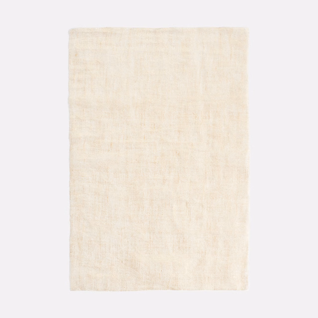 Warm ivory sheer swatch with faint vertical slubs and a softly crosshatched weave