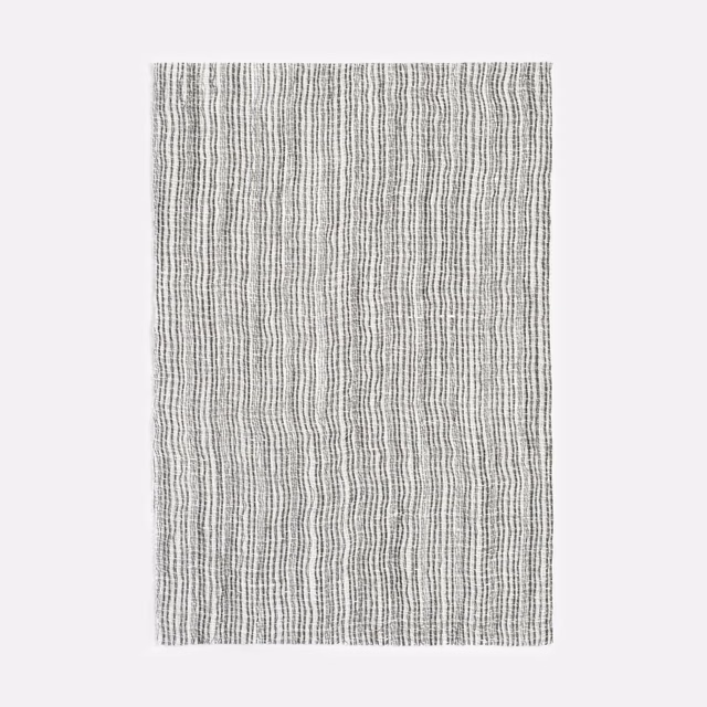 Silver-grey sheer fabric with closely spaced, irregular vertical woven lines