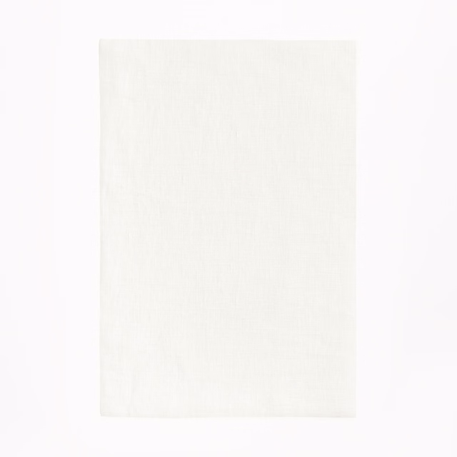 Near-white Bianco sheer swatch showing a fine, softly vertical woven texture