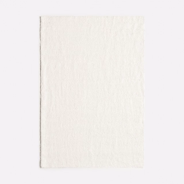 Ivory sheer swatch with a softly raised, fine vertical irregular texture