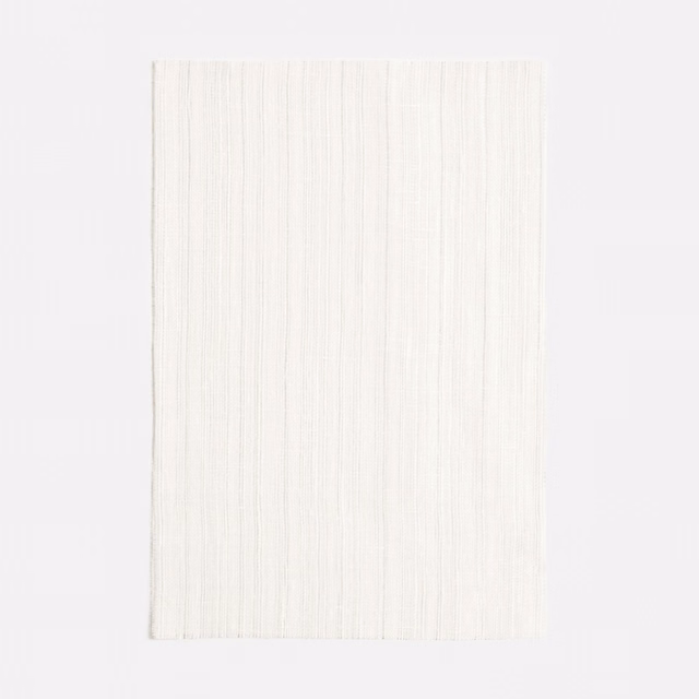 Ivory sheer fabric swatch with fine irregular vertical slub lines