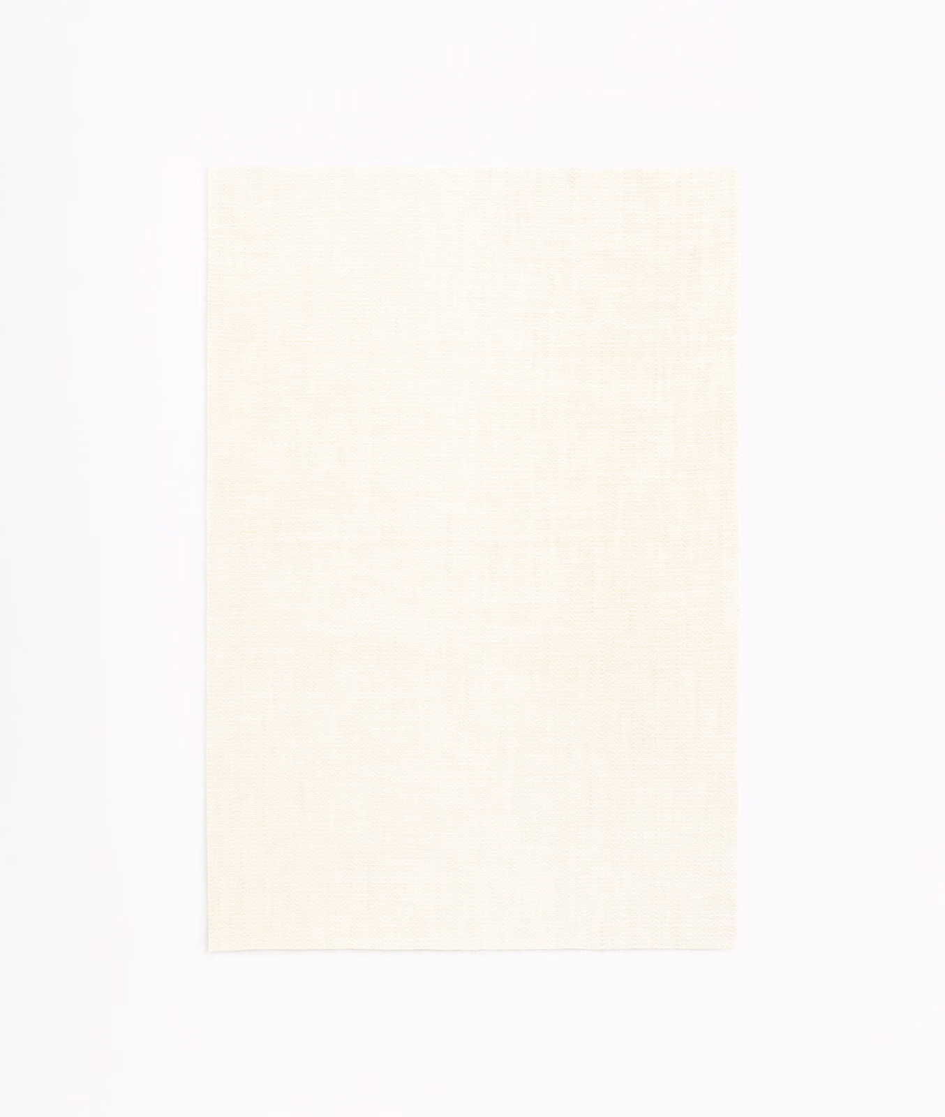 Warm ivory sheer swatch showing a fine, lightly crosshatched plain weave