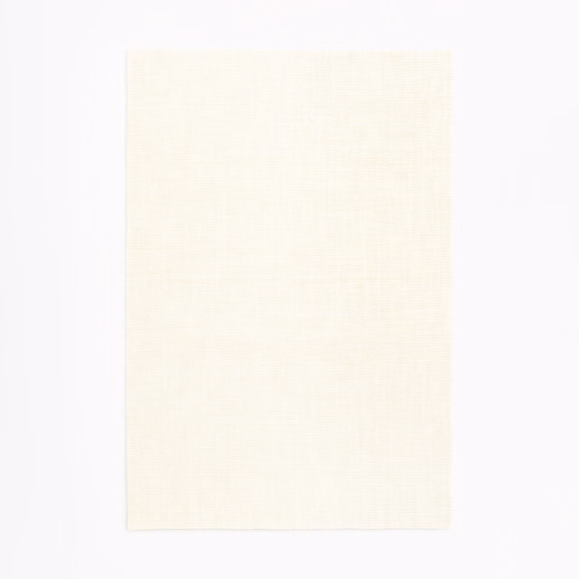 Warm ivory sheer swatch showing a fine, lightly crosshatched plain weave