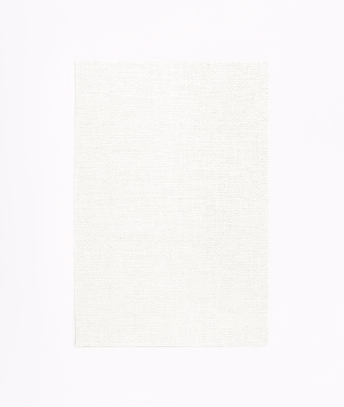 Pale ivory sheer fabric with a fine, lightly slubbed linen-like weave