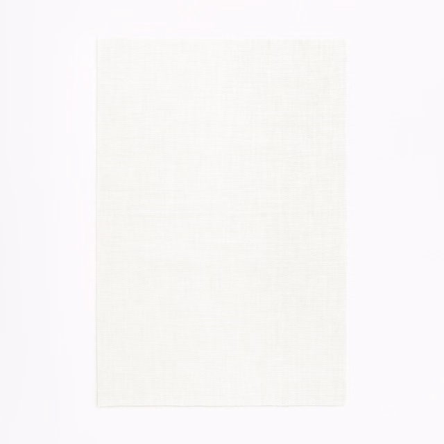 Pale ivory sheer fabric with a fine, lightly slubbed linen-like weave