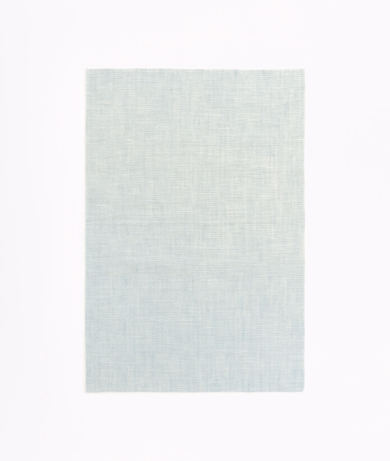 Pale glacier blue-grey sheer fabric with a fine linen-like crossweave texture