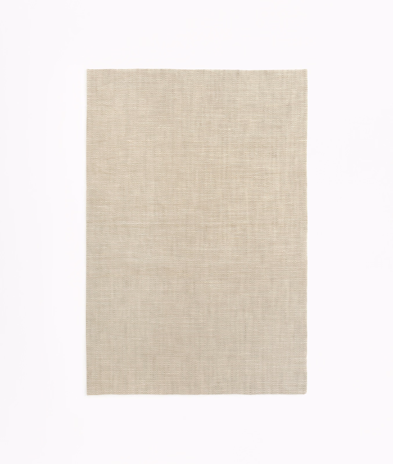 Pale greige plain-weave fabric swatch with a fine linen-like crosshatch texture