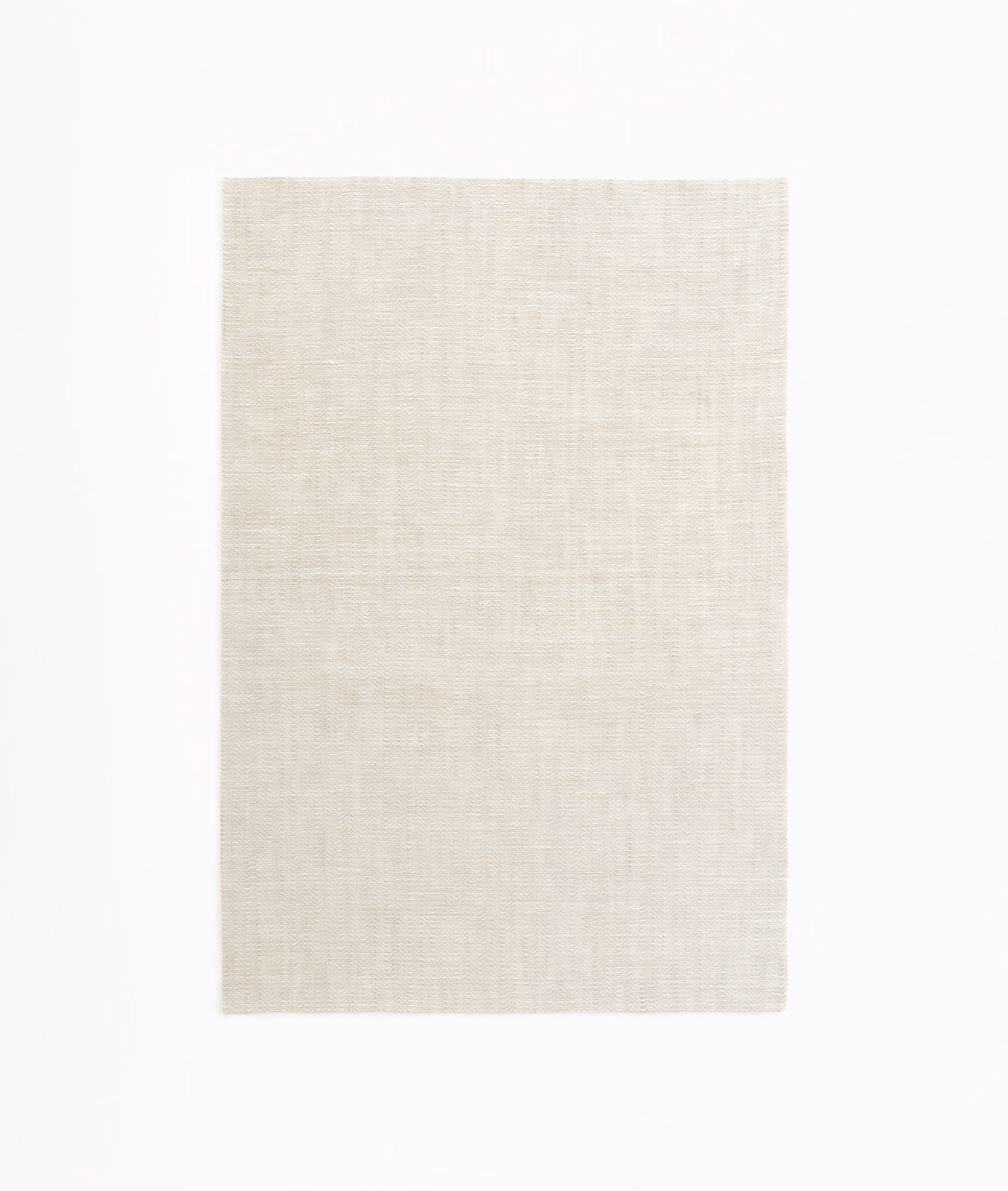 Pale mastic beige sheer swatch with a fine, subtly crosshatched woven texture