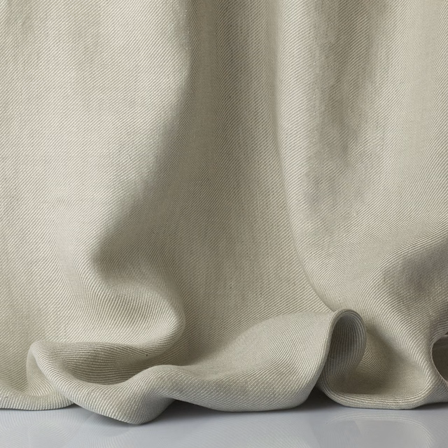 Pale pearl-grey sheer fabric with fine ribbed texture falling in fluid folds