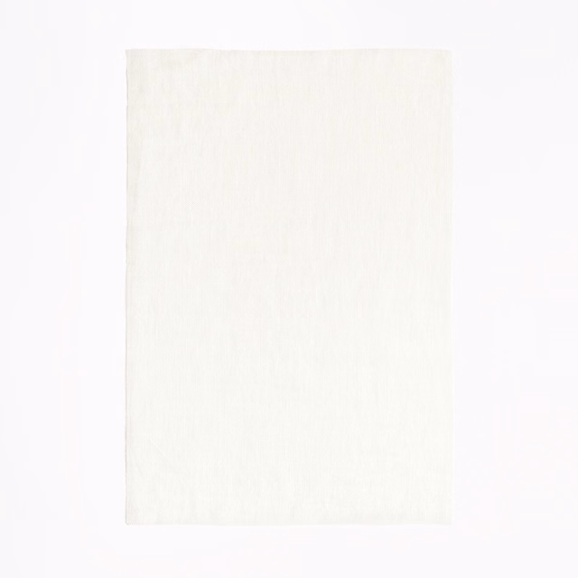 Soft ivory-white sheer swatch with fine vertical slub texture