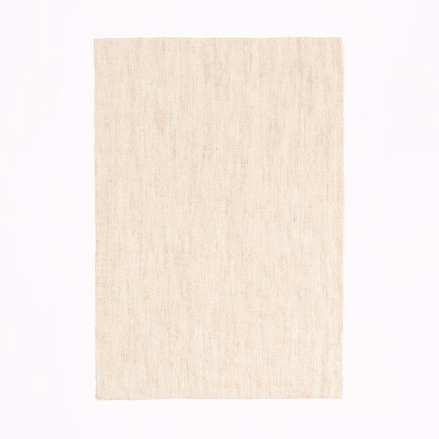Warm ivory sheer fabric with delicate vertical slubs and a softly textured weave