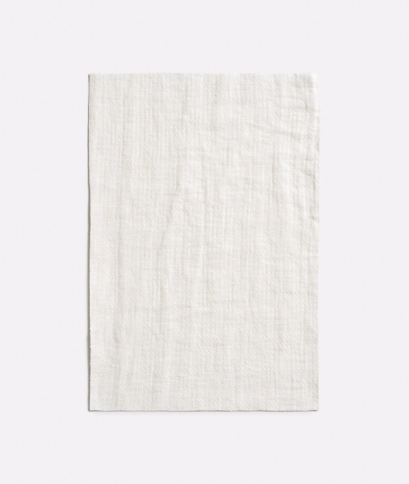 Soft ivory sheer with a fine irregular linen-textured weave and subtle vertical slubs