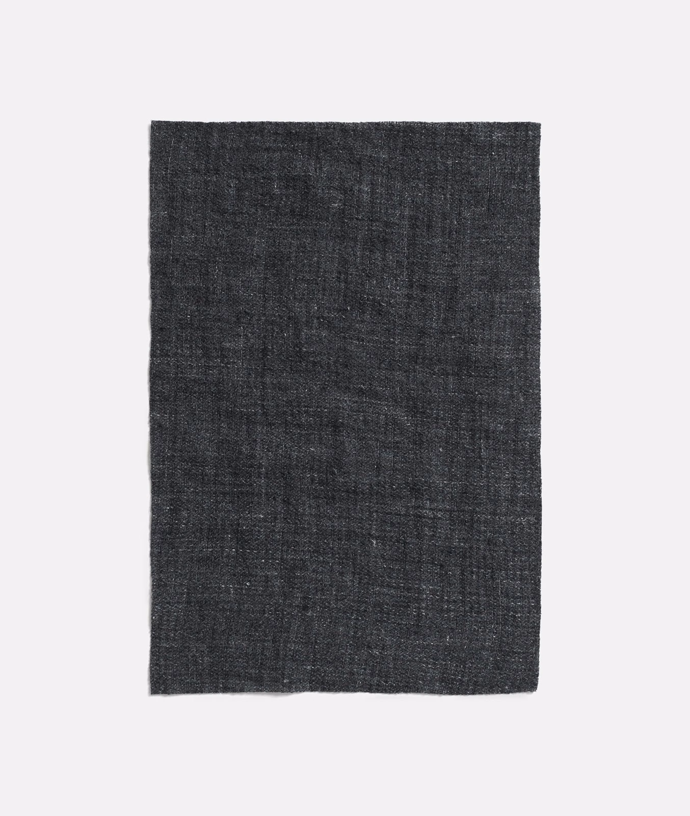 Charcoal indigo sheer with an open, irregular linen weave and subtle blue-grey variation