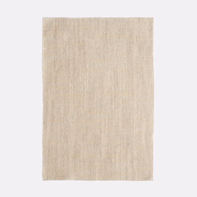 Pale warm beige sheer fabric with subtle vertical slub texture