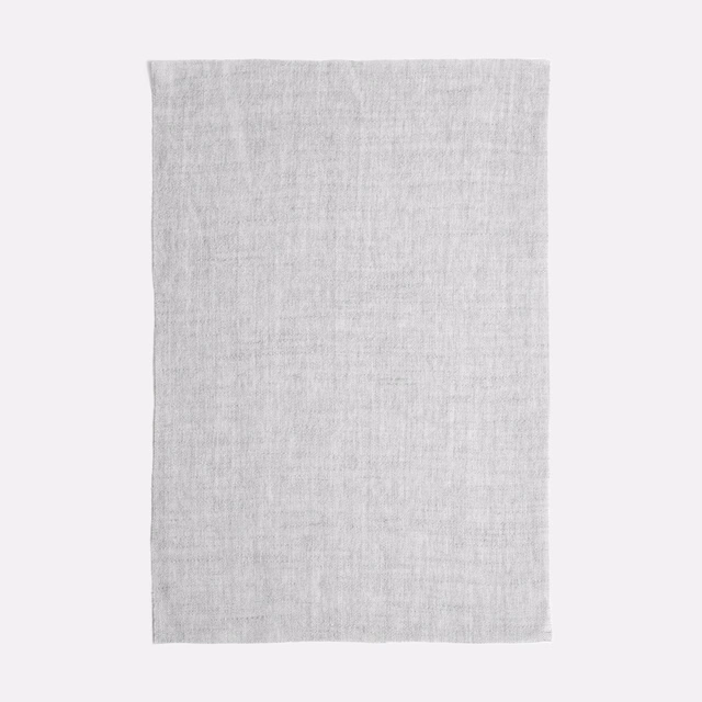 Pale cool-grey sheer swatch with a fine softly crosshatched woven texture