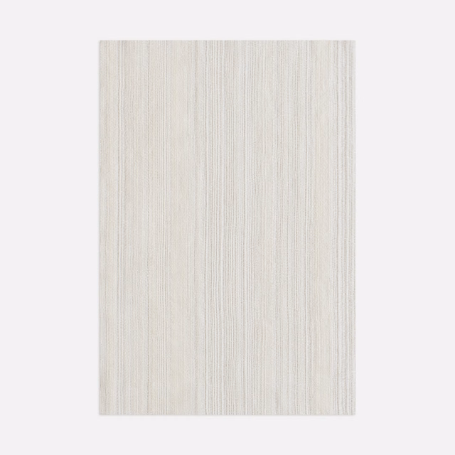 Pale ivory sheer textile with delicate irregular vertical striations and softly varied surface
