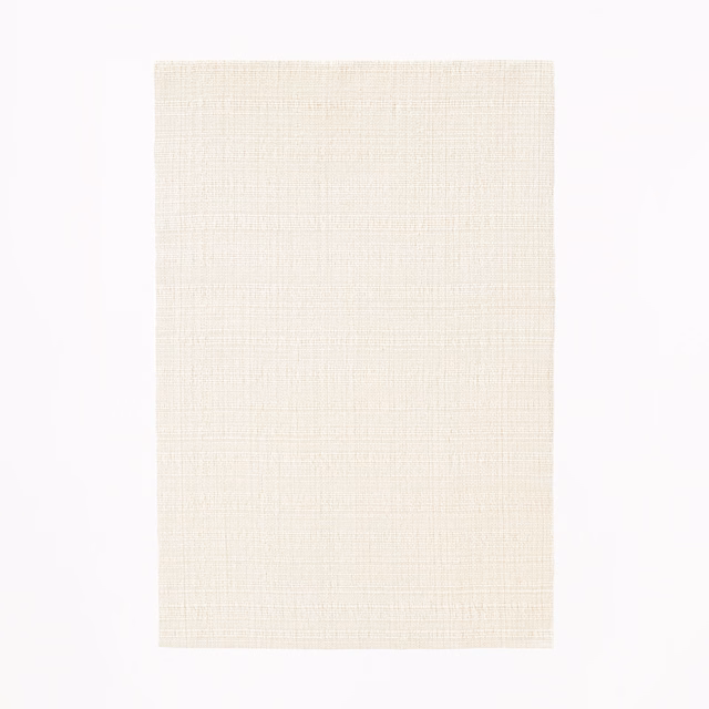 Pale ivory Perla fabric swatch showing a fine, softly crosswoven surface