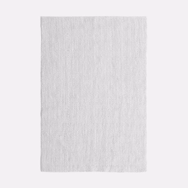 Pale pearl-grey sheer fabric with fine vertical striated texture