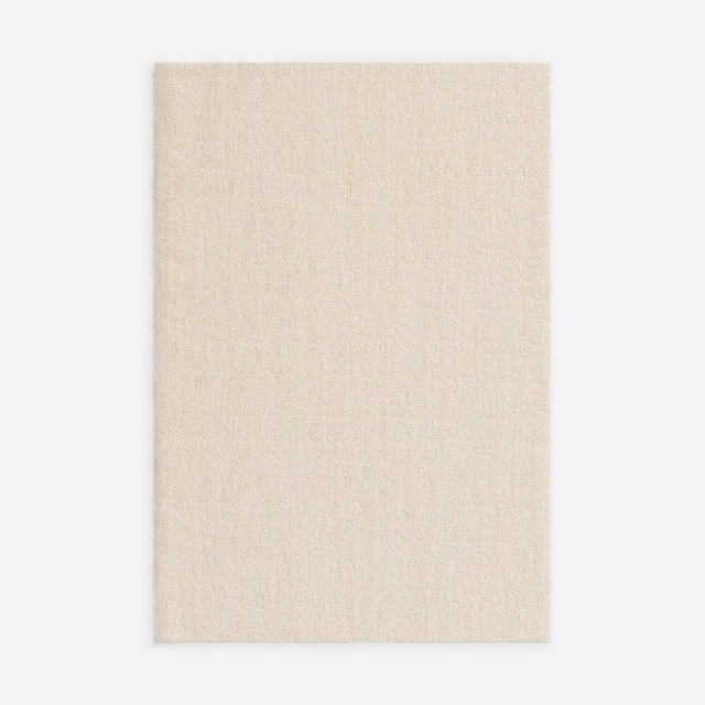 Pale sandy beige sheer swatch with a fine, softly flecked woven texture