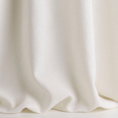 Soft natural ivory sheer cloth falling in broad, fluid folds