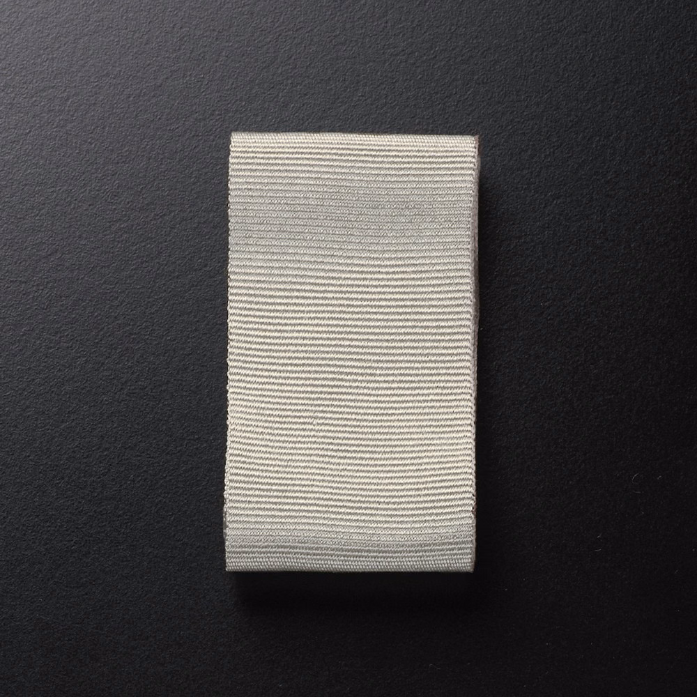 Warm marzipan cream swatch with densely spaced horizontal woven ribs