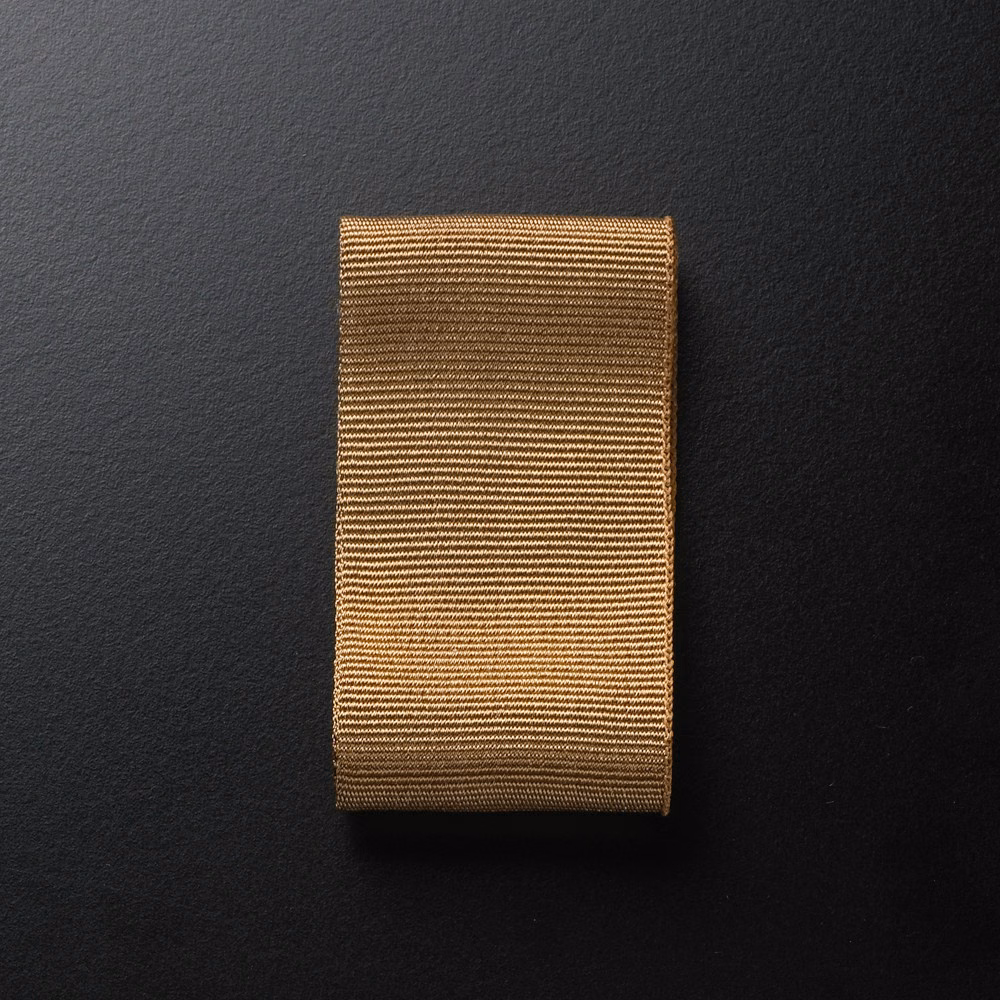 Warm hazelnut Ribbon Nocciola fabric with tightly spaced horizontal ribs and soft sheen